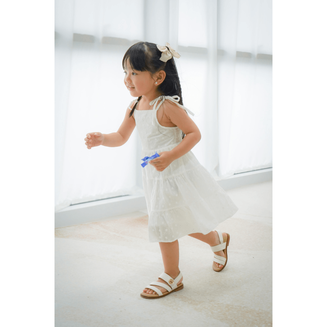 Mini Eyelet Sleeveless Smocked Dress.png