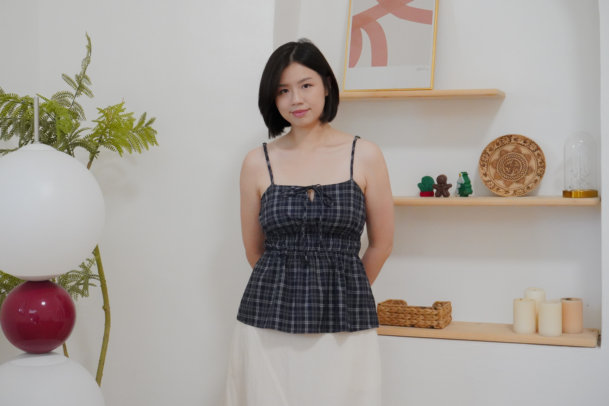 Peony checked tie-front top styled with white trousers from The Fleur Label